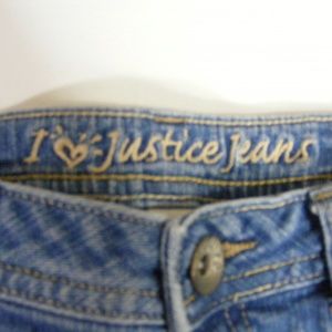 WOMANS SHORT SHORTS JUSTICE JEANS PRE OWNED 12 1/2
